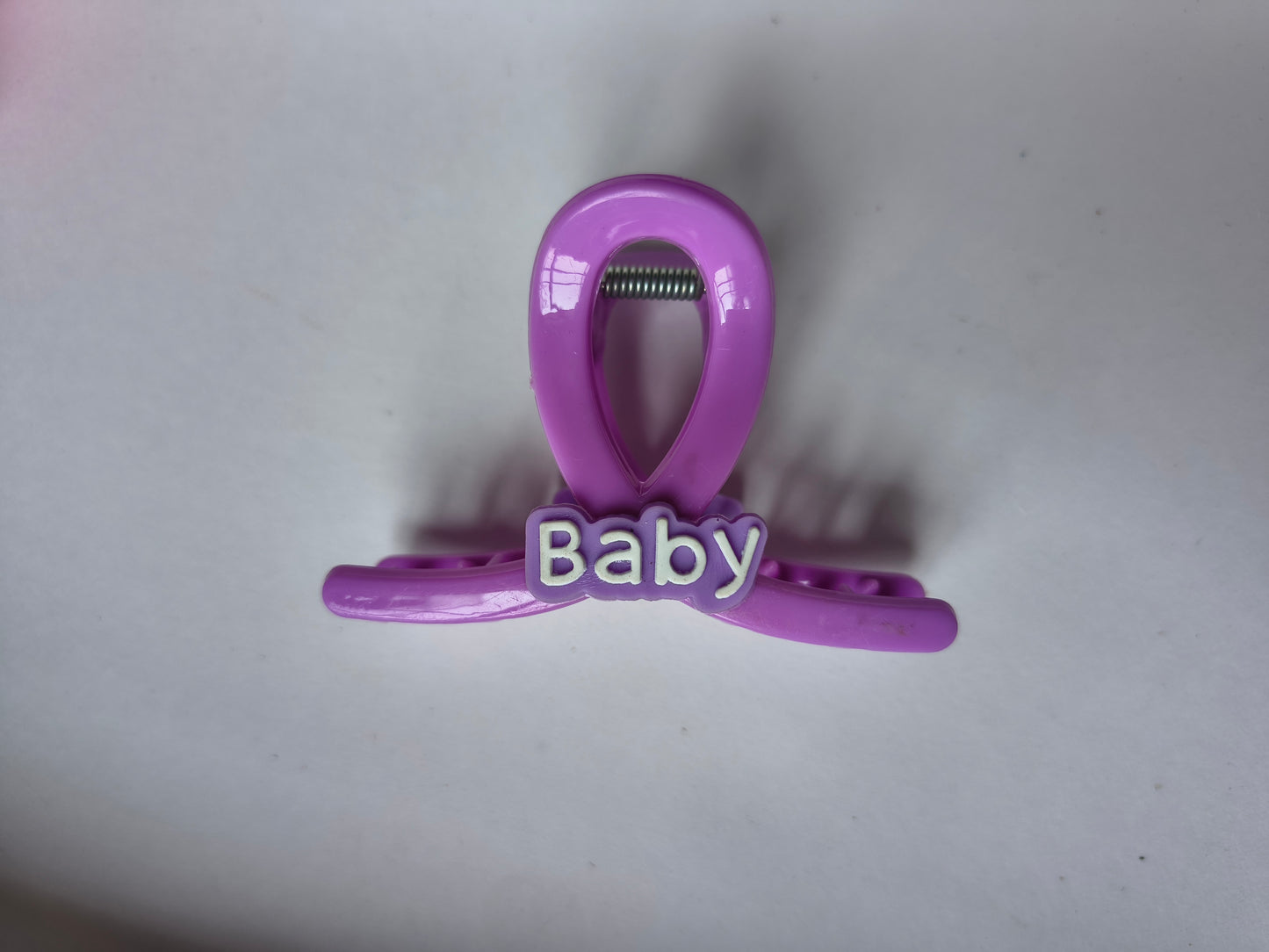 Trendy purple "Baby" letter design for a cute and stylish look.